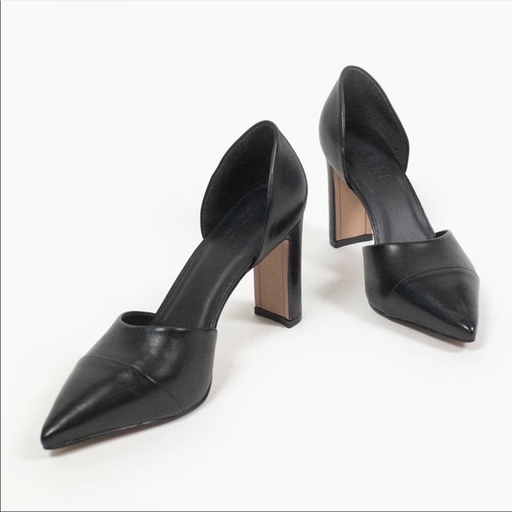 Black leather pumps